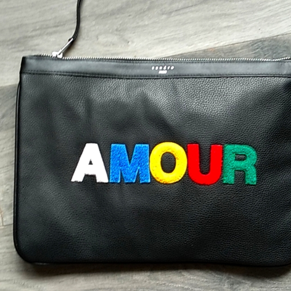 Black leather pouch by Sandro Paris.